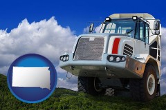 south-dakota map icon and a heavy-duty truck